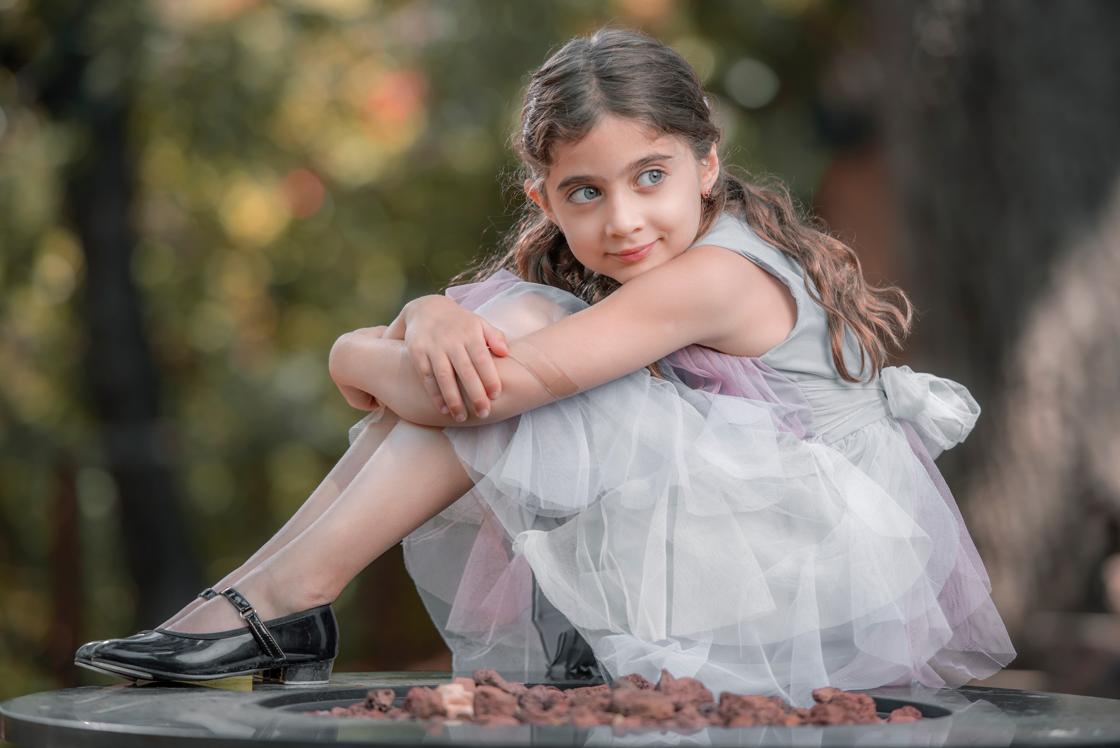 Child portrait in tulle dress outdoors